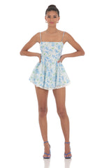 Blue Floral Ruffle Romper in White